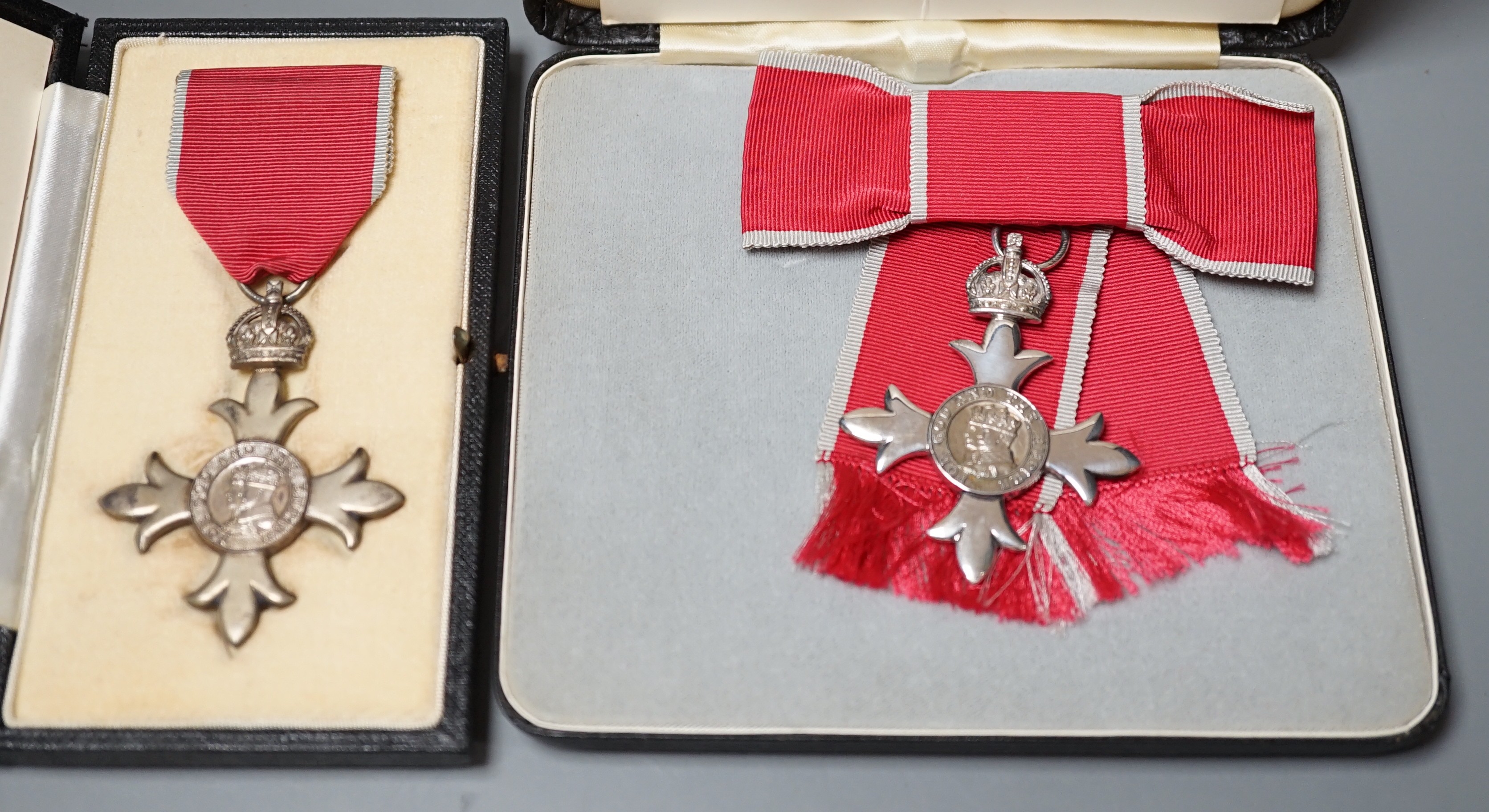 Two cased QEII MBE medals together with three sets of MBE related paperwork to Lt. Commander Paris. N. Anderson, VRD, Miss phyllis S.Colebrooke and Frederick H Temple Esq.